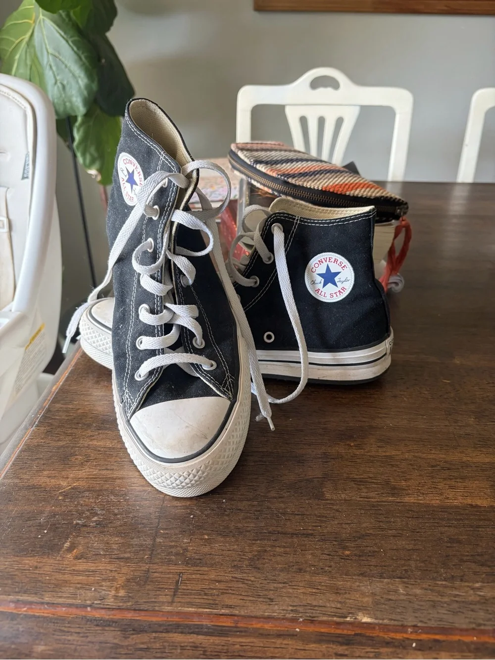 Converse Chuck Taylor’s Black and White High Top Sneakers
